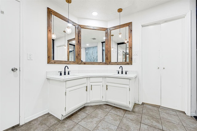 8727 Vinkins Rd, Houston, TX 77071 - bathroom featuring double vanity and tile patterned flooring