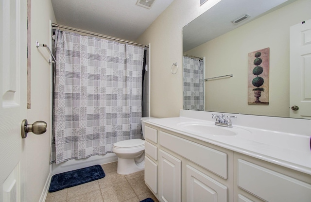 11704 Shoal Lndg, Pearland, TX 77584 - full bathroom featuring vanity, tile patterned flooring, and shower / bath combo with shower curtain