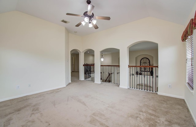 11704 Shoal Lndg, Pearland, TX 77584 - spare room featuring lofted ceiling, a ceiling fan, and carpet flooring