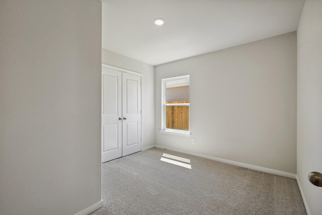 10430 Red Cardinal Dr, Cleveland, TX 77328 - unfurnished bedroom featuring carpet floors, a closet, and recessed lighting