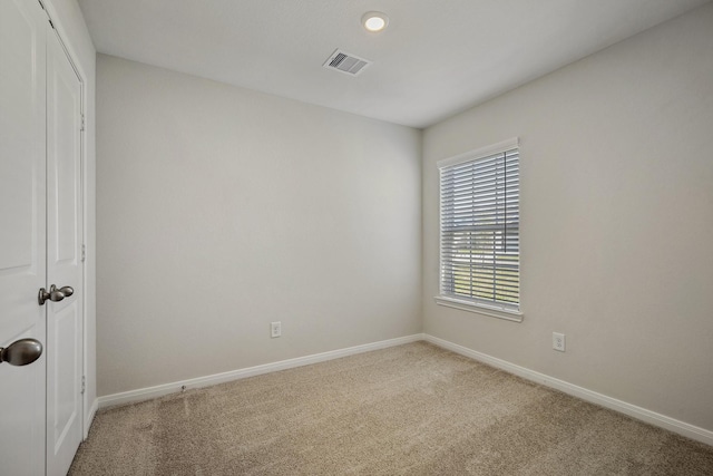 10430 Red Cardinal Dr, Cleveland, TX 77328 - carpeted spare room with baseboards and recessed lighting