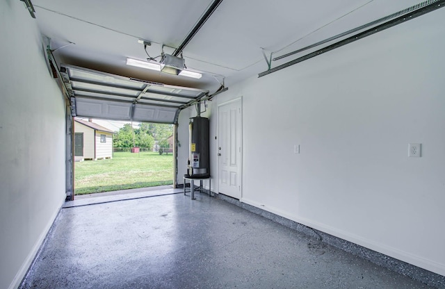 12407 Big Oaks Dr, Houston, TX 77050 - garage with gas water heater and a garage door opener