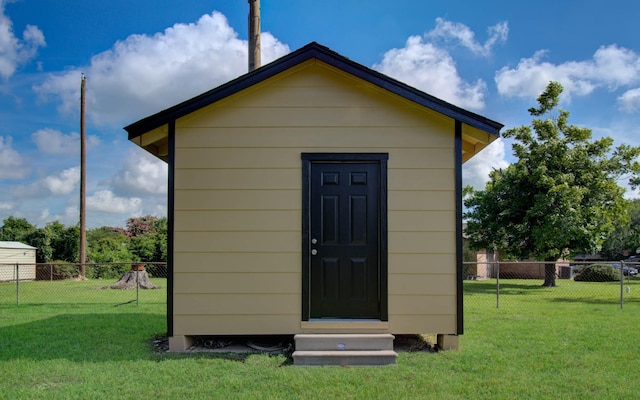 12407 Big Oaks Dr, Houston, TX 77050 - view of outbuilding with entry steps and a fenced backyard