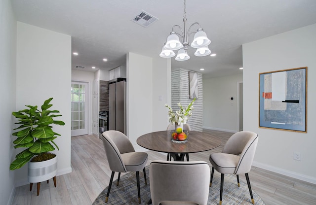 12407 Big Oaks Dr, Houston, TX 77050 - dining space with a chandelier, light wood-style flooring, and recessed lighting