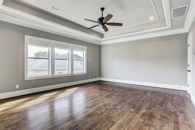 8015 Serenity Ct, Houston, TX 77025 - empty room with a raised ceiling, a ceiling fan, wood finished floors, ornamental molding, and recessed lighting