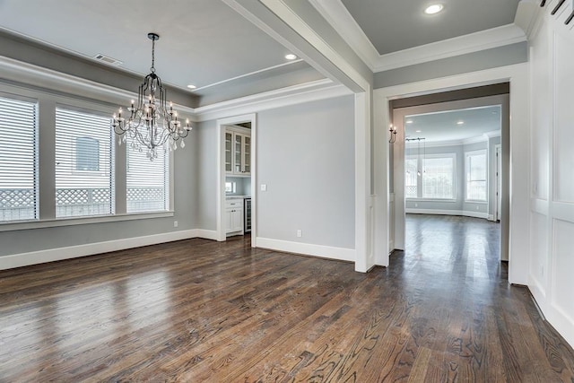8015 Serenity Ct, Houston, TX 77025 - unfurnished dining area with ornamental molding, a chandelier, dark wood finished floors, and recessed lighting
