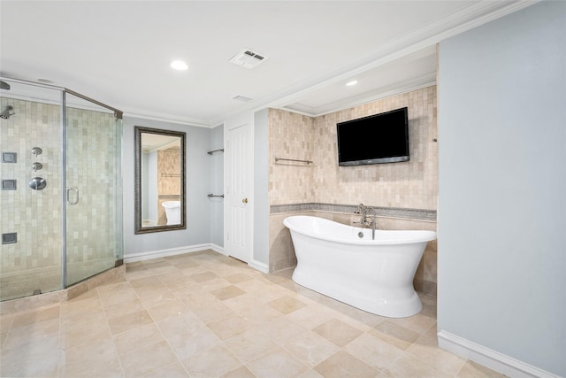 2105 Del Monte Dr, Houston, TX 77019 - bathroom featuring a freestanding bath, a stall shower, crown molding, tile patterned floors, and recessed lighting