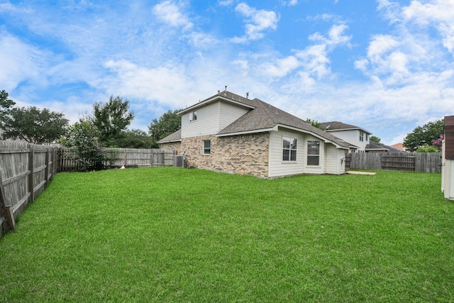 6902 Sterling Meadow Dr, Katy, TX 77449 - rear view of property with a fenced backyard and brick siding