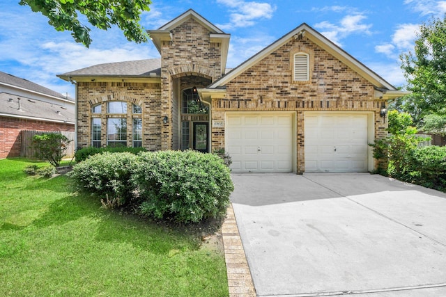 6902 Sterling Meadow Dr, Katy, TX 77449 - view of front facade featuring brick siding, concrete driveway, a garage, a front yard, and a shingled roof