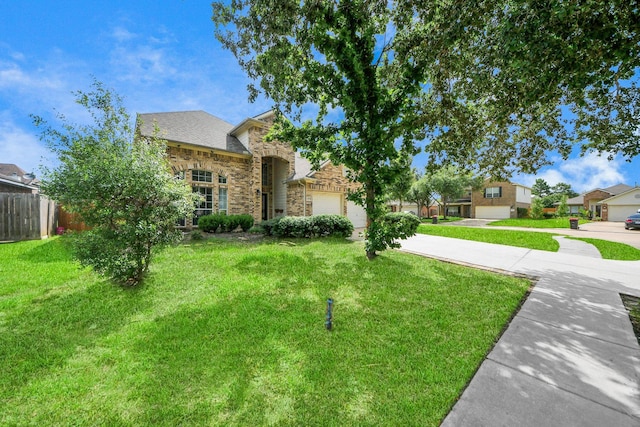 6902 Sterling Meadow Dr, Katy, TX 77449 - traditional home with stone siding and driveway