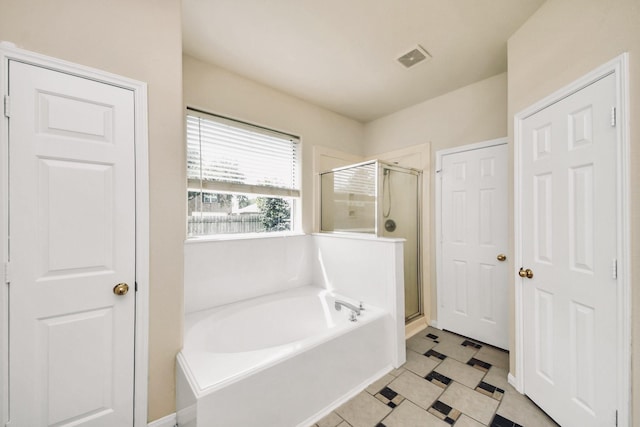 6902 Sterling Meadow Dr, Katy, TX 77449 - bathroom with a garden tub and a shower stall