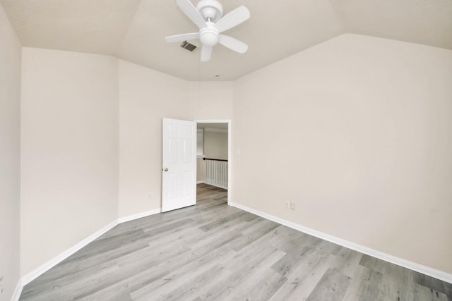 6902 Sterling Meadow Dr, Katy, TX 77449 - unfurnished bedroom featuring lofted ceiling, light wood-style flooring, and ceiling fan