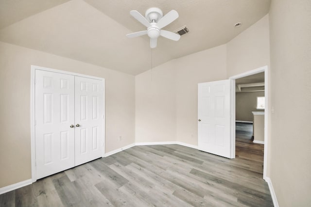6902 Sterling Meadow Dr, Katy, TX 77449 - unfurnished bedroom with wood finished floors, a ceiling fan, a closet, and high vaulted ceiling