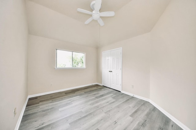 6902 Sterling Meadow Dr, Katy, TX 77449 - unfurnished bedroom featuring wood finished floors, a closet, lofted ceiling, and a ceiling fan