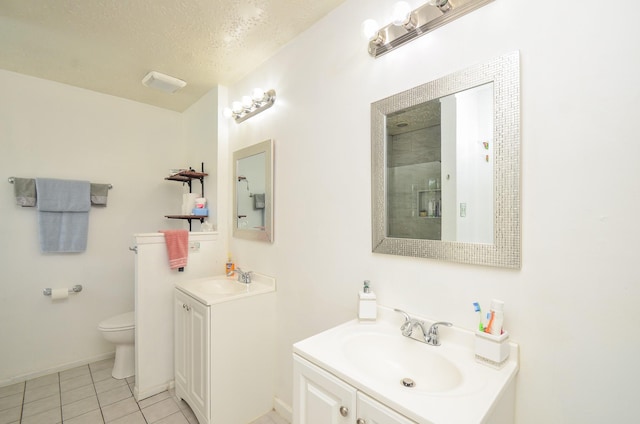 4318 Glen Avon Dr, Pasadena, TX 77505 - bathroom with two vanities, tile patterned floors, a shower, and a textured ceiling