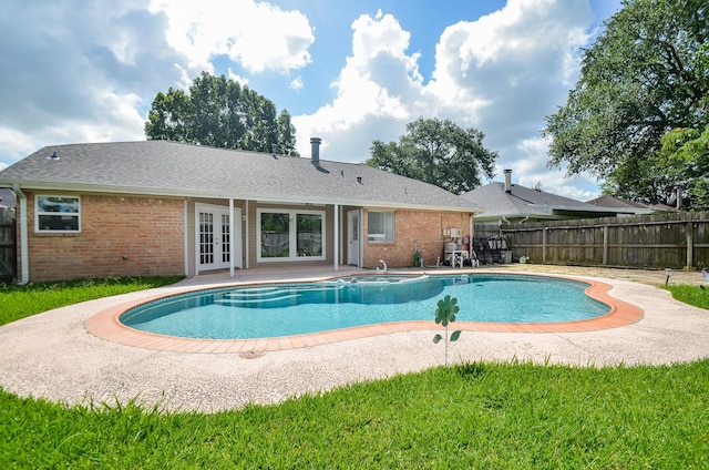 4318 Glen Avon Dr, Pasadena, TX 77505 - view of pool featuring french doors, a patio, and a jacuzzi