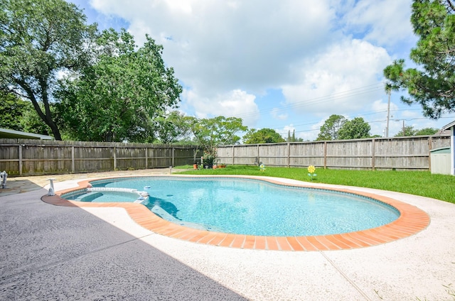 4318 Glen Avon Dr, Pasadena, TX 77505 - view of pool with a fenced backyard, a pool with connected hot tub, and a patio area