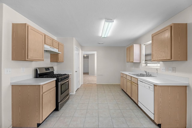 16810 Perryton Ln, Houston, TX 77073 - kitchen featuring stainless steel gas range, dishwasher, under cabinet range hood, and light brown cabinets