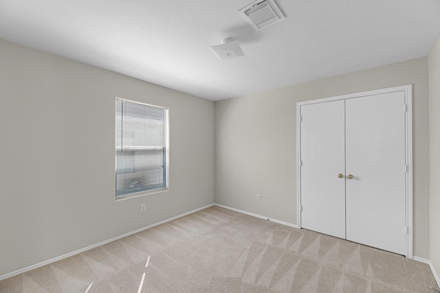 16810 Perryton Ln, Houston, TX 77073 - unfurnished bedroom featuring carpet flooring and a closet