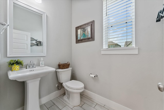 18635 Parkland Square Pl, Cypress, TX 77433 - bathroom with toilet and baseboards