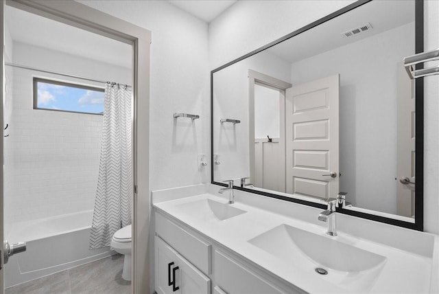 6214 Bois D Arc St, League City, TX 77573 - bathroom with double vanity, shower / tub combo, and tile patterned floors