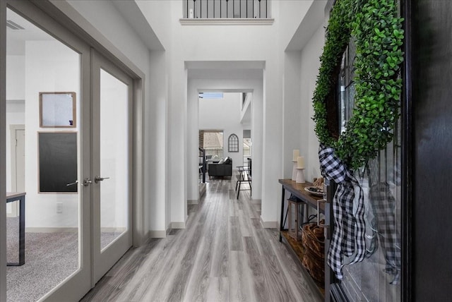 6214 Bois D Arc St, League City, TX 77573 - entrance foyer with french doors and wood finished floors