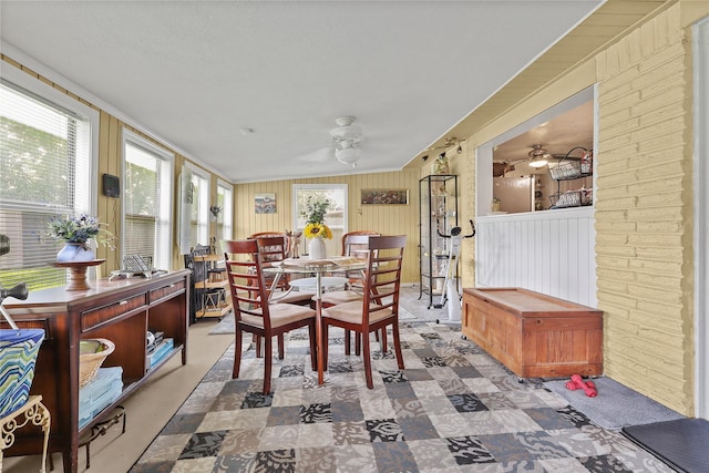 826 Ivyhollow Dr, Channelview, TX 77530 - sunroom / solarium with wood walls and tile patterned floors