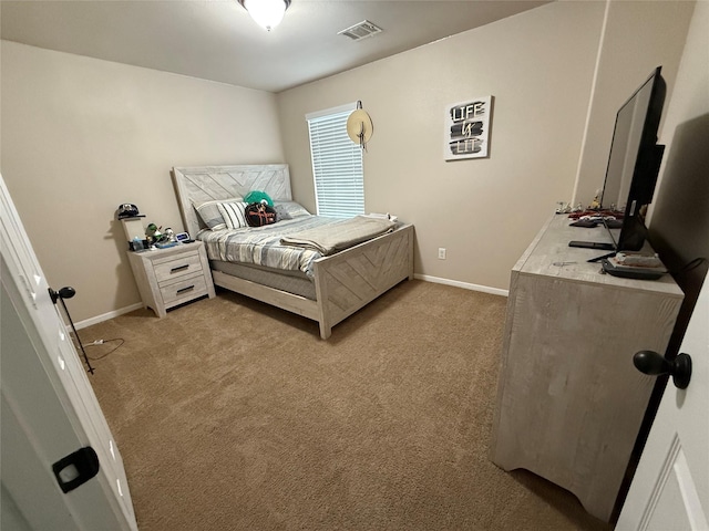 9022 Saint Laurent Ln, Houston, TX 77044 - bedroom with light colored carpet and baseboards