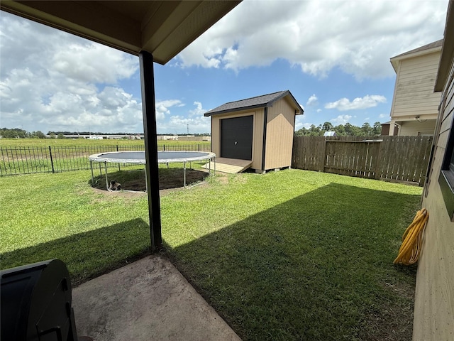 9022 Saint Laurent Ln, Houston, TX 77044 - fenced backyard featuring a shed and a trampoline