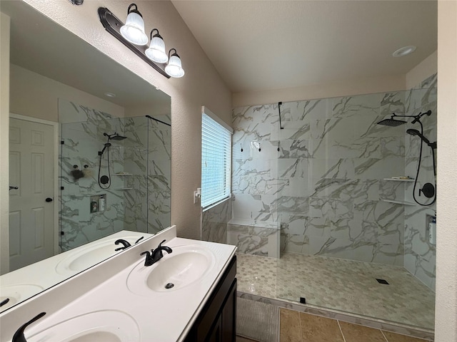 9022 Saint Laurent Ln, Houston, TX 77044 - bathroom with a marble finish shower and double vanity
