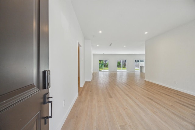 10225 Shadow Oaks Dr, Houston, TX 77043 - spare room with light wood-type flooring and recessed lighting