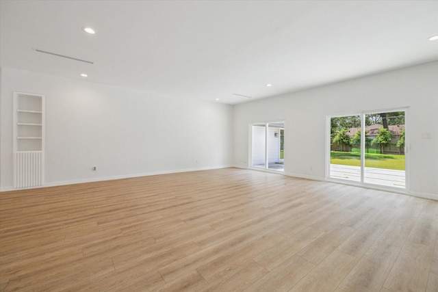 10225 Shadow Oaks Dr, Houston, TX 77043 - spare room with light wood-style flooring and recessed lighting