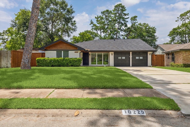 10225 Shadow Oaks Dr, Houston, TX 77043 - ranch-style house featuring a garage, driveway, and brick siding