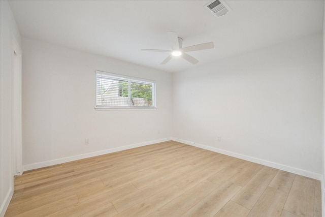 10225 Shadow Oaks Dr, Houston, TX 77043 - spare room featuring light wood-style floors and a ceiling fan
