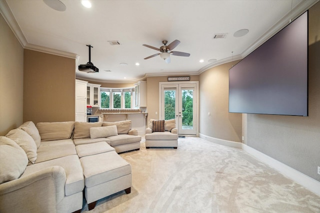 6 Kings Lake Estates Blvd, Kingwood, TX 77346 - living area featuring ceiling fan, crown molding, recessed lighting, light carpet, and french doors