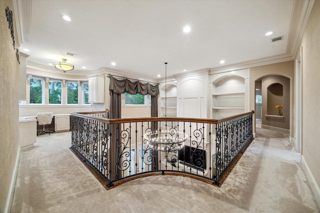 6 Kings Lake Estates Blvd, Kingwood, TX 77346 - corridor featuring crown molding, carpet, an upstairs landing, recessed lighting, and arched walkways