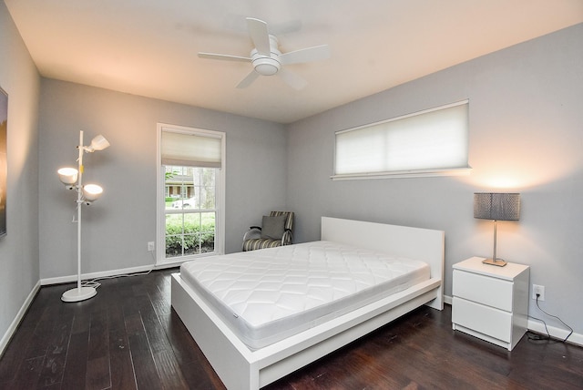 327 Cinnamon Oak Ln, Houston, TX 77079 - bedroom featuring dark wood finished floors and a ceiling fan
