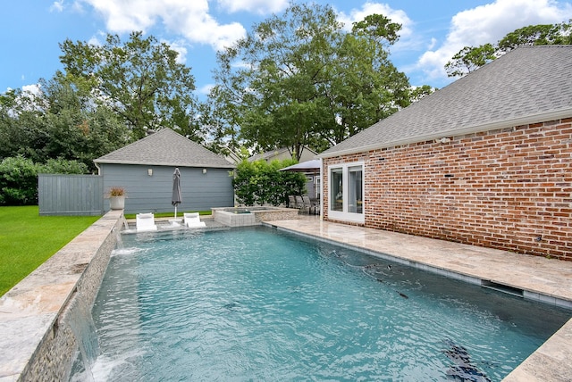 327 Cinnamon Oak Ln, Houston, TX 77079 - view of pool featuring a patio area and a pool with connected hot tub