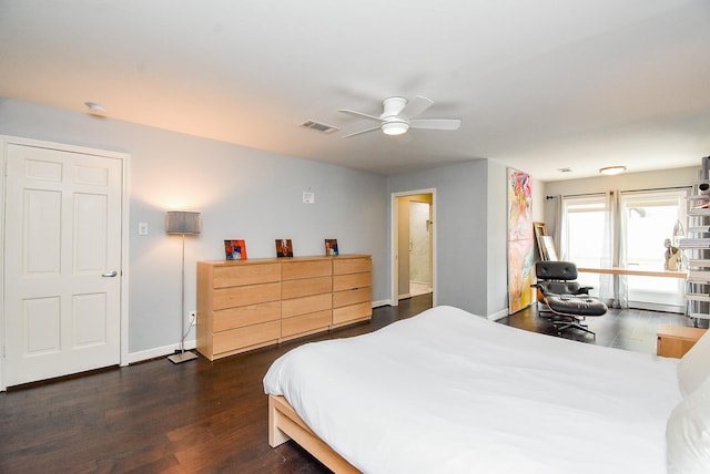 327 Cinnamon Oak Ln, Houston, TX 77079 - bedroom featuring dark wood-style flooring and ceiling fan