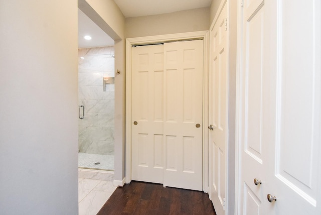327 Cinnamon Oak Ln, Houston, TX 77079 - corridor featuring recessed lighting and dark marble finish flooring