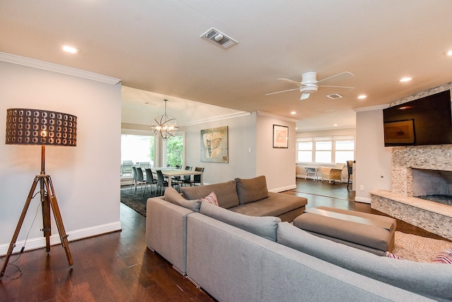 327 Cinnamon Oak Ln, Houston, TX 77079 - living room with ornamental molding, plenty of natural light, a ceiling fan, dark wood-style flooring, and recessed lighting