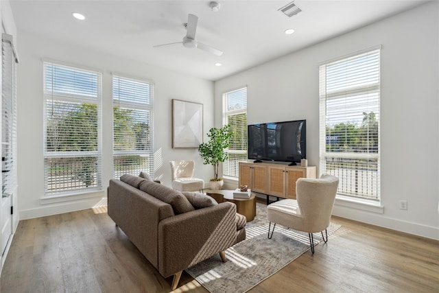 3219 Brewster St, Houston, TX 77026 - living area with ceiling fan, light wood-type flooring, and recessed lighting