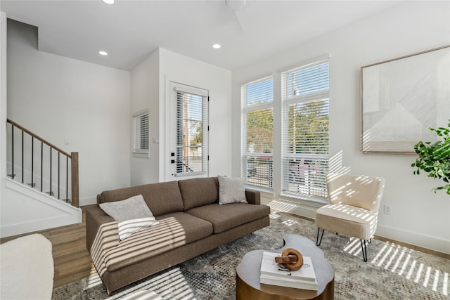 3219 Brewster St, Houston, TX 77026 - living room featuring stairway, recessed lighting, wood finished floors, and ceiling fan