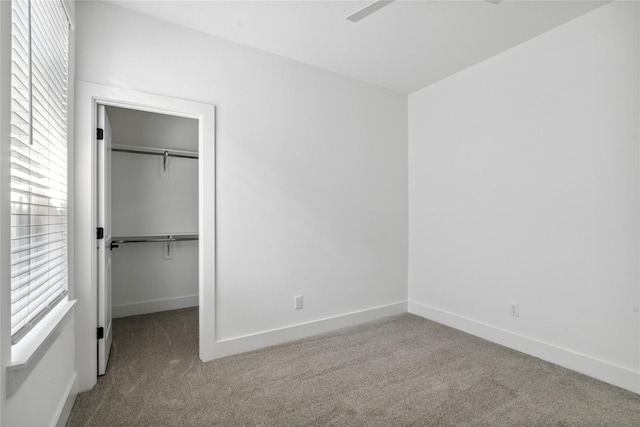 3219 Brewster St, Houston, TX 77026 - unfurnished bedroom featuring carpet, a closet, and a spacious closet