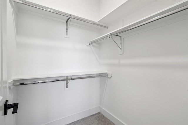 3219 Brewster St, Houston, TX 77026 - walk in closet featuring carpet floors