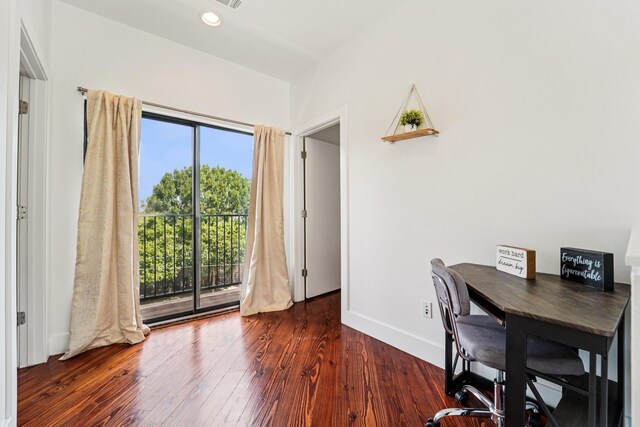 2209 Bastrop St, Houston, TX 77003 - half bath featuring wood finished floors and toilet