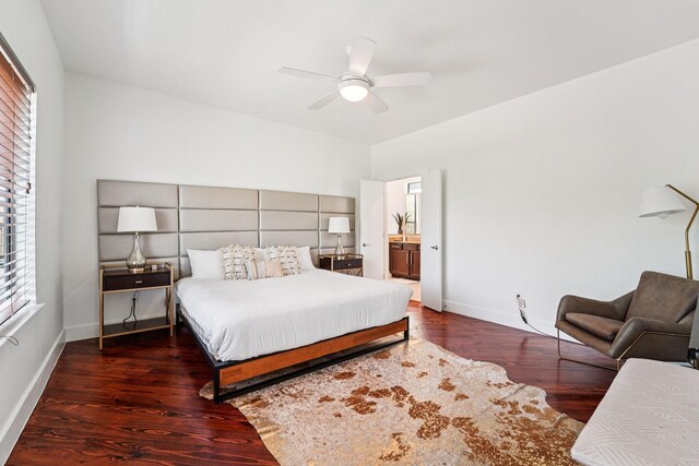 2209 Bastrop St, Houston, TX 77003 - bedroom with wood finished floors, ceiling fan, and connected bathroom