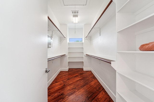 2209 Bastrop St, Houston, TX 77003 - spacious closet featuring attic access and dark wood finished floors
