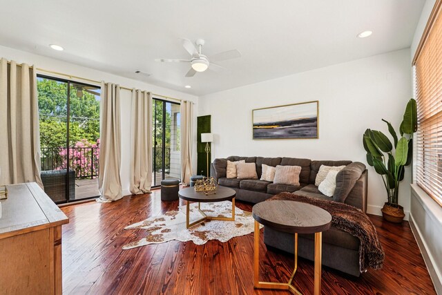 2209 Bastrop St, Houston, TX 77003 - living area featuring dark wood-style flooring, ceiling fan, and recessed lighting
