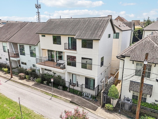 2209 Bastrop St, Houston, TX 77003 - view of building exterior with a residential view